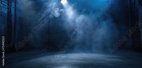 Mysterious Stage with Blue Spotlight and Fog