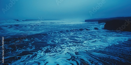 Atmospheric evening photo of ocean landscape, blue effect