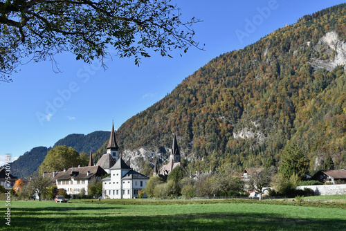 Forested Mountain Ridge in Interlaken, Switzerland with Castle and Monastery Frame Left
