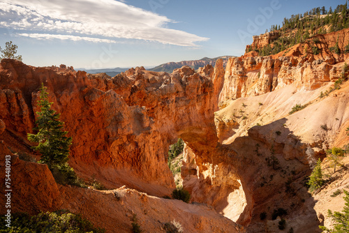 Sunlight Over Natural Bridge Arch in Bryce Canyon