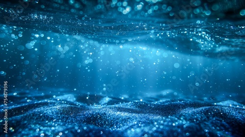 Mystical Deep Blue Underwater Ocean Scene with Sunlight Filtering Through Water Surface