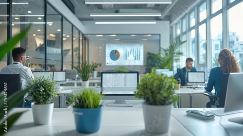An elegantly designed modern office space, illustrating the contrast between internal and external accounting. a team of in-house accountants is deeply engaged in work. Generative AI.