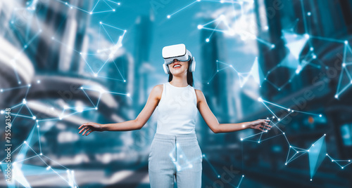 Female stand wear white VR headset and white sleeveless connect metaverse, future technology create cyberspace community. She look around and gesticulate enjoy fantasy building in meta. Hallucination.