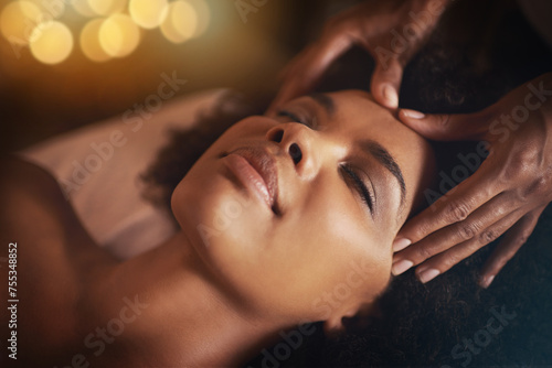 Black woman, hands and head massage with masseuse, beauty and bodycare at spa for stress relief and wellness. Closeup of face, treatment and healing for zen, self care and relax at luxury resort