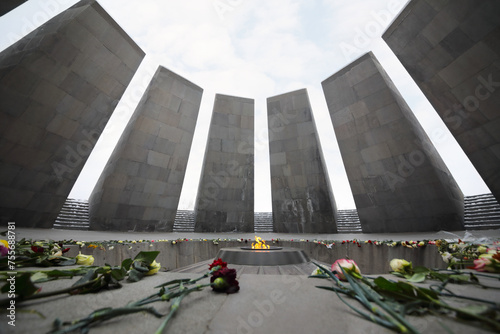  Flowers are on floor in Memorial complex Tsitsernakaberd, dedicated to genocide of armenians in 1915