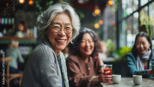 Happy senior asian woman sitting in restaurants, asian senior lifestyle