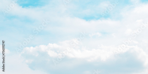 Blue sky with cumulus white fluffy cloud. Soft blur pastel sky for background backdrop. Beautiful nature. Heaven concept. Freedom of life, New life beginning and Positive energy concepts. 