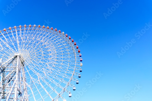 Tempozan ferris wheel in Kaiyukan, Osaka, Japan. Popular tourist destination.