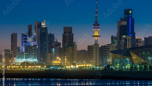 Seaside skyline of Kuwait city from night to day timelapse