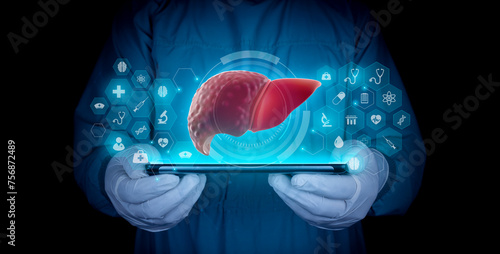 The doctor studies and analyzes cirrhosis and hepatitis of the liver on his tablet. Hepatologist isolated on dark background shows the liver in poor condition through a digital hologram.