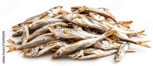 Dried fish or anchovy stack on white background