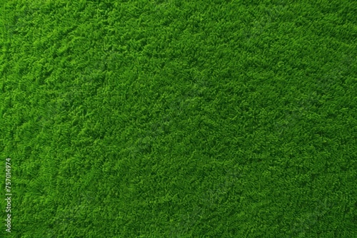 Aerial perspective of synthetic grass texture Decorative turf for garden football and golf Green backdrop