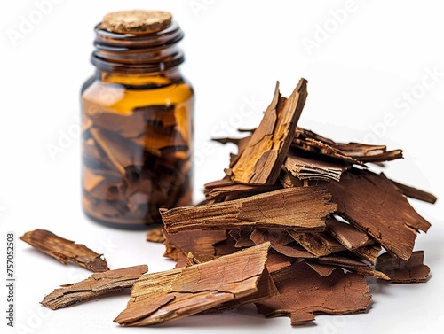 Yohimbe Extract A cluster of yohimbe bark or a bottle of yohimbe extract supplements