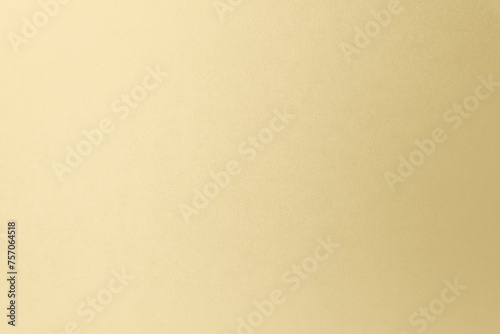 Soft creamy beige tone color paint on environmental friendly cardboard box blank paper texture background with space minimal style