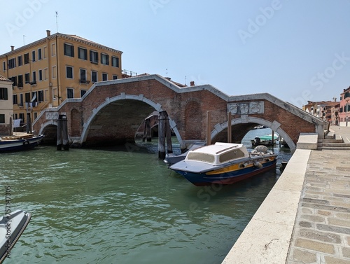 The Tre Archi (three arches) bridge was planned and executed by the Italian architect Andrea Tirali in 1668. It is one of a kind among Venice bridges that connect all the canals. 