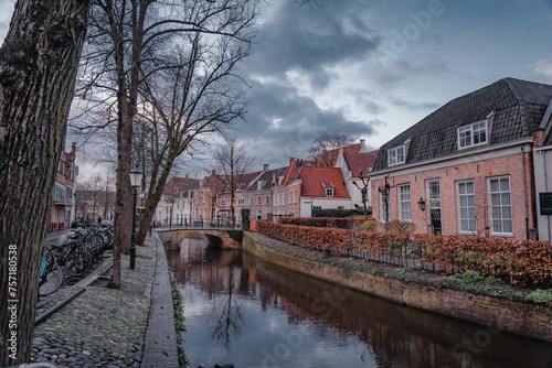 Amersfoort Netherlands, March 26 2023: Historic medieval city center on a rainy day. Narrow street with medieval houses in the historic center of Amersfoort at dusk.