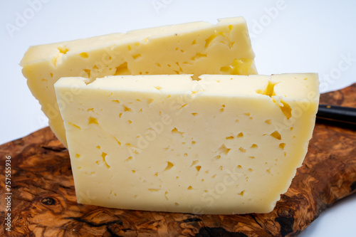 Fresh Asiago cow's milk cheese, from Asiago in Italy, used in panini or sandwiches or melted on variety of dishes, classified as a Swiss-type Alpine cheese