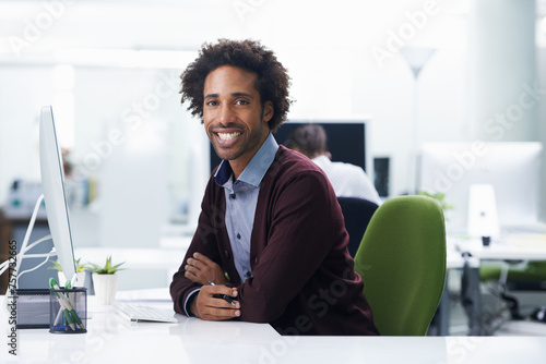 Portrait, computer or design and happy black man in office with creative career mission or mindset. Creative, startup and agency with smile of young designer in artistic workplace for employment