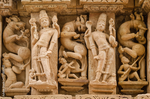 Stone carved sculpture on the outer wall of The Parshwanath temple, Adinath temple, Jain temple, Eastern group of temples, Khajuraho, Madhya Pradesh, India, Asia.