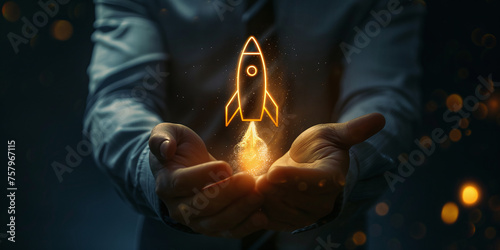 Businessman holding hologram rocket with glowing light effect on dark background presenting business success award concept and first place winner in technology