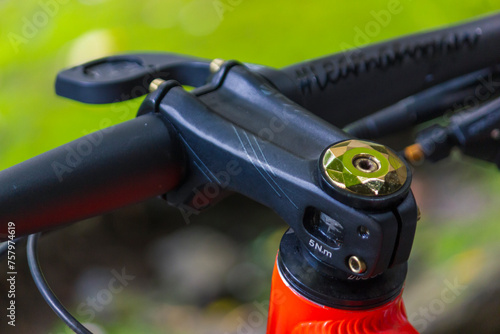 Closeup shot of a mountain bike stem isolated on blurry background 
