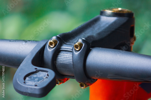 Closeup shot of a mountain bike stem isolated on blurry background 