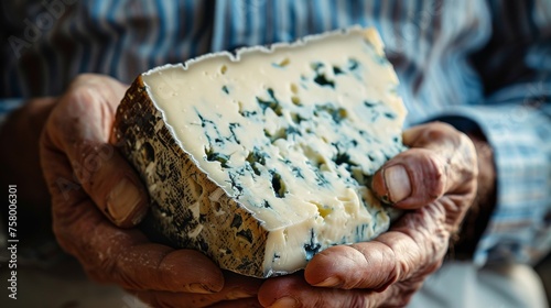 Elderly man holding a piece of gourmet Roquefort cheese, vibrant color contrast