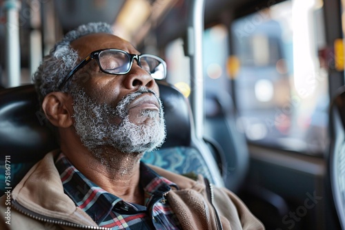 A black man with a peaceful expression, closing his eyes and taking a deep breath as he enjoys a moment of tranquility on the bus, letting go of stress and tension as he embraces the journey ahead