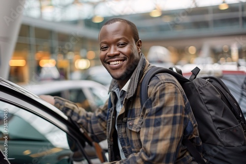 A smiling black man stepping out of a taxi, his luggage in hand as he arrives at the airport for a much-awaited vacation. The bustling terminal and busy airport scene reflect the energy of travel