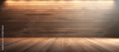 An empty room with hardwood flooring and wooden walls in various shades of brown and amber. The horizon of planks creates a cozy atmosphere