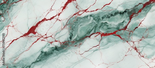 A detailed shot of a green and white marble texture resembling a winter landscape with red veins intricately woven throughout