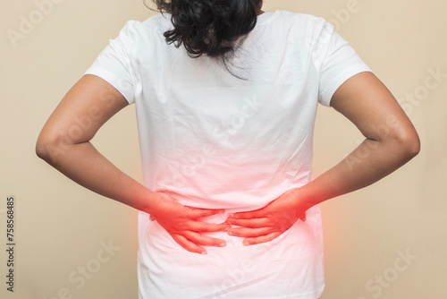imitative representation of Indian Lady feeling back pain. 