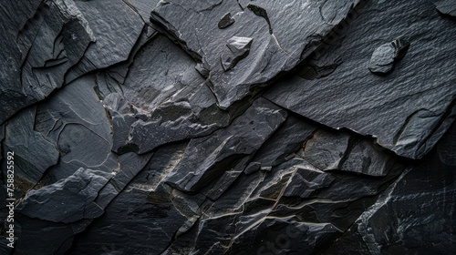 Black slate texture. Dark gray stone background.