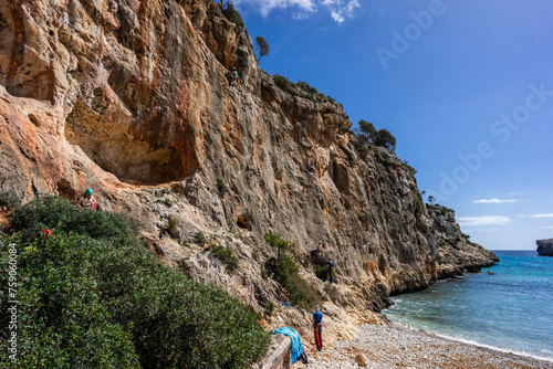 climbers on the cliff paths, Cala Magraner, Manacor coast, Majorca, Balearic Islands, Spain