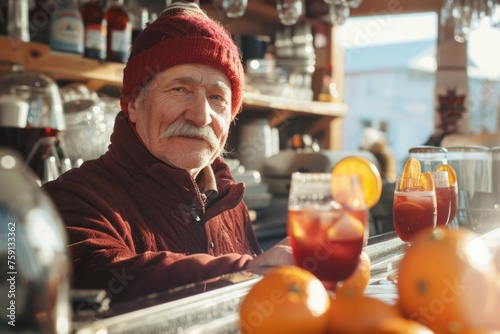 A man selling mulled wine. warming drink. Cocktail. hot tea. Winter. Europe
