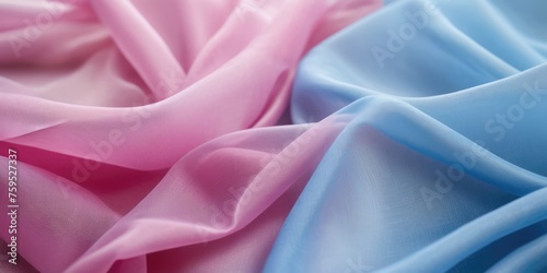 The thin pink and blue fabric sags in folds under its own weight