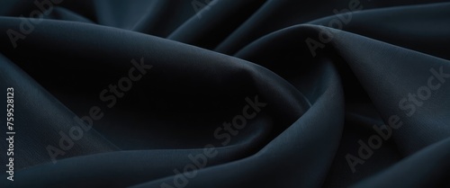 Elegant twisted folds of black fabric