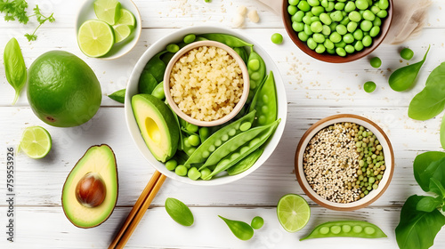 Healthy vegan food. Buddha bowl with quinoa, fried tofu, avocado, edamame, green peas, radish, cabbage and sesame seeds. White kitchen table background, top view