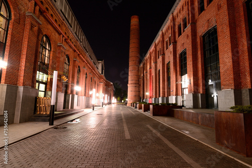 Extensive office complex exterior in loft style. Red brick buildings of former factory gasholders.