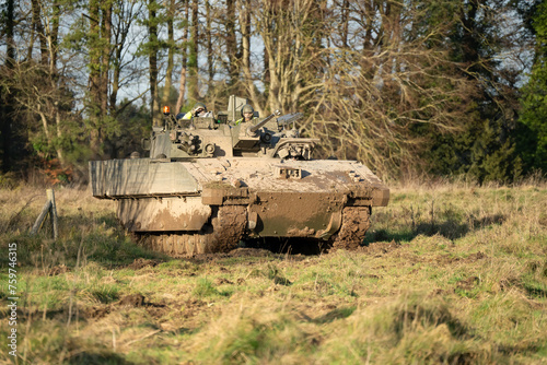 British army General Dynamics Ajax Reconnaissance and Strike armoured fighting vehicle (AFV) in action