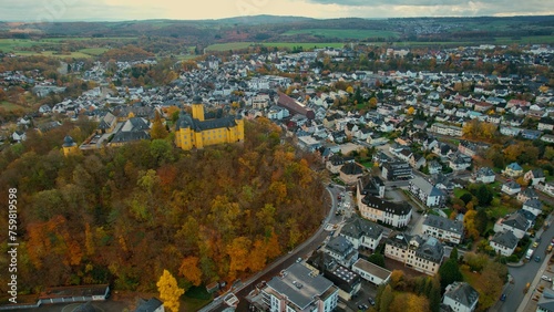 Aerial view of the old town around the city Montabaur on an overcast day in fall in Germany. 