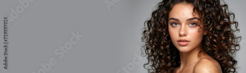portrait of a girl with curly hair and smooth skin, product presentation, advertising banner