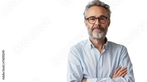 A man with grey hair and glasses stands confidently, his arms crossed, exuding wisdom and experience