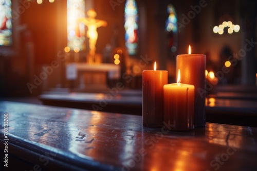 Candles in church with altar in background. Beautiful catholic or Lutheran cathedral with many lit candles as prayer or memory symbol. Beautiful lights in Christian basilica and crucifix in background