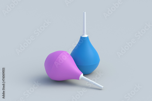 Two enemas on gray background. Rubber douching bag. Pear shaped syringe bulb. Medical clyster. Nasal aspirator. Laboratory tool. Constipation treatment. 3d render