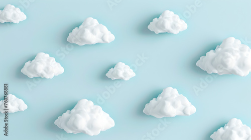 white fluffy clouds evenly distributed on pastel colored light blue background