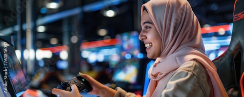 Portrait of a beautiful muslim woman playing video games in a casino
