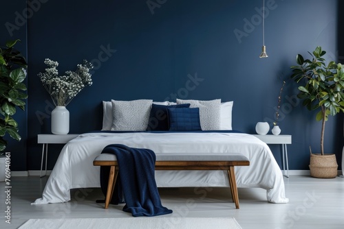 Modern bedroom interior with trendy combination of blue and orange colors elements