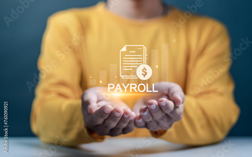 Payroll business finance concept. Automatic salary payment system. report financial information and do payroll, Financial, accounting. Person holding payroll icon on virtual screen.