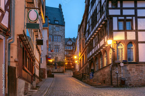 Night medieval street with traditional half-timbered houses, Marburg an der Lahn, Hesse, Germany